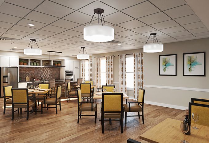 A modern dining area with elegant furnishings and ambient lighting.
