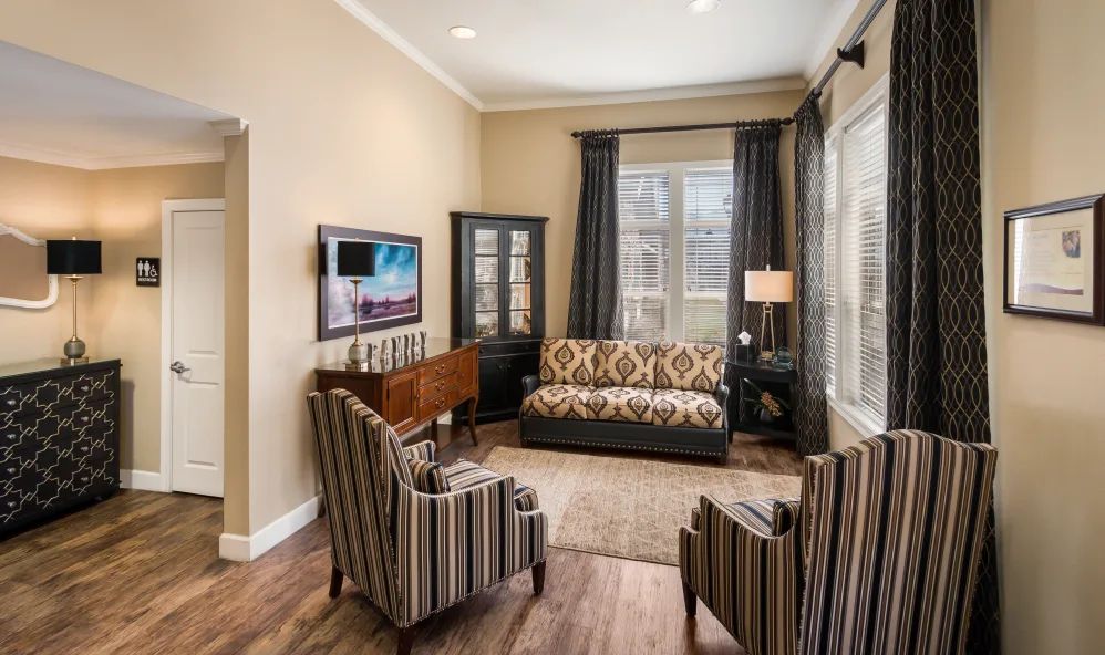 A cozy living room with modern decor and comfortable seating.