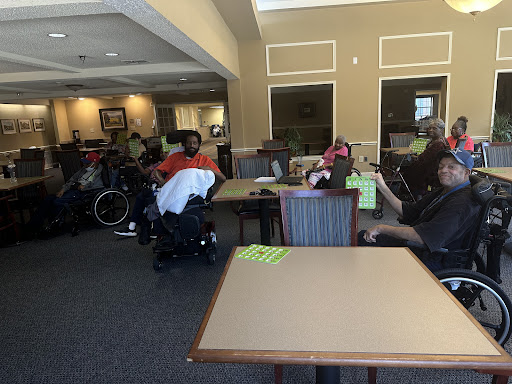 Residents enjoying a social activity in a communal space.