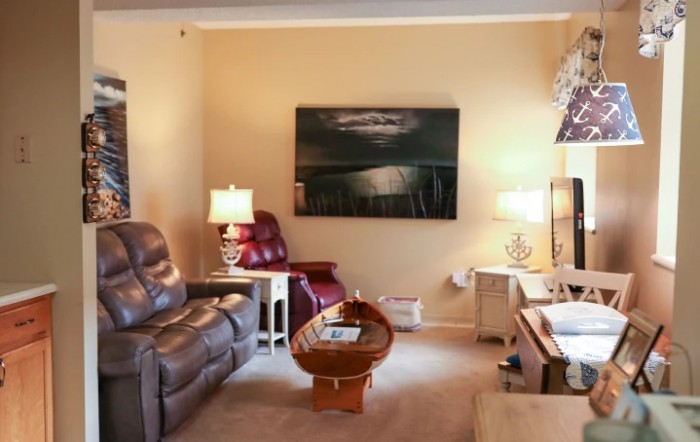 A cozy living room with comfortable seating and stylish decor.