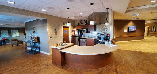 A modern kitchen featuring stylish appliances and a well-designed countertop.
