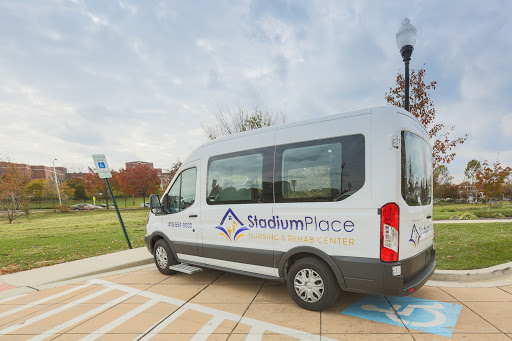 A ShuttlefromPlace van parked in an outdoor area, ready to provide transportation services.