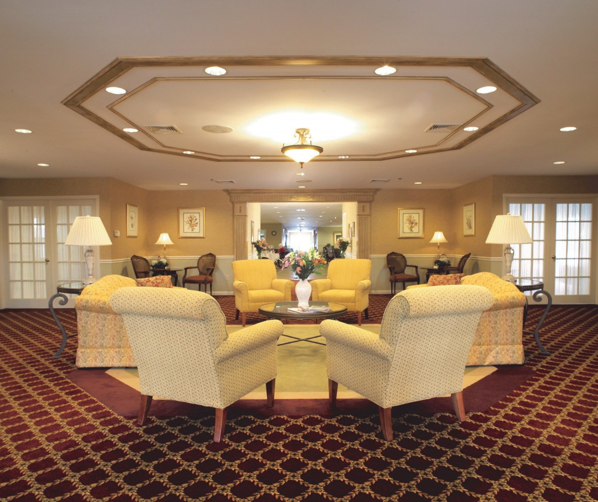 A luxurious hotel lobby with comfortable seating and elegant decor.
