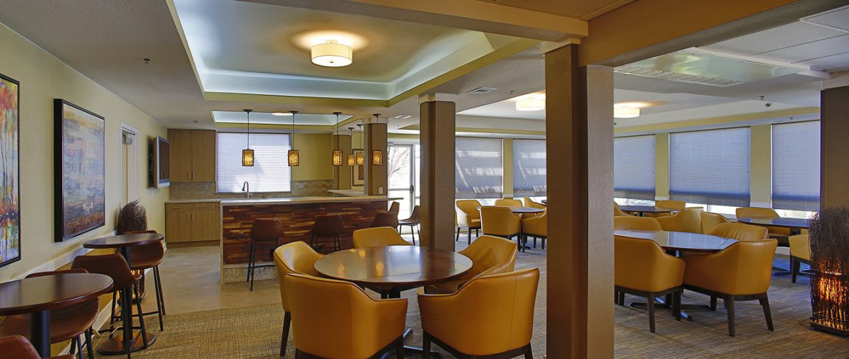 A modern restaurant interior with comfortable seating and ambient lighting.