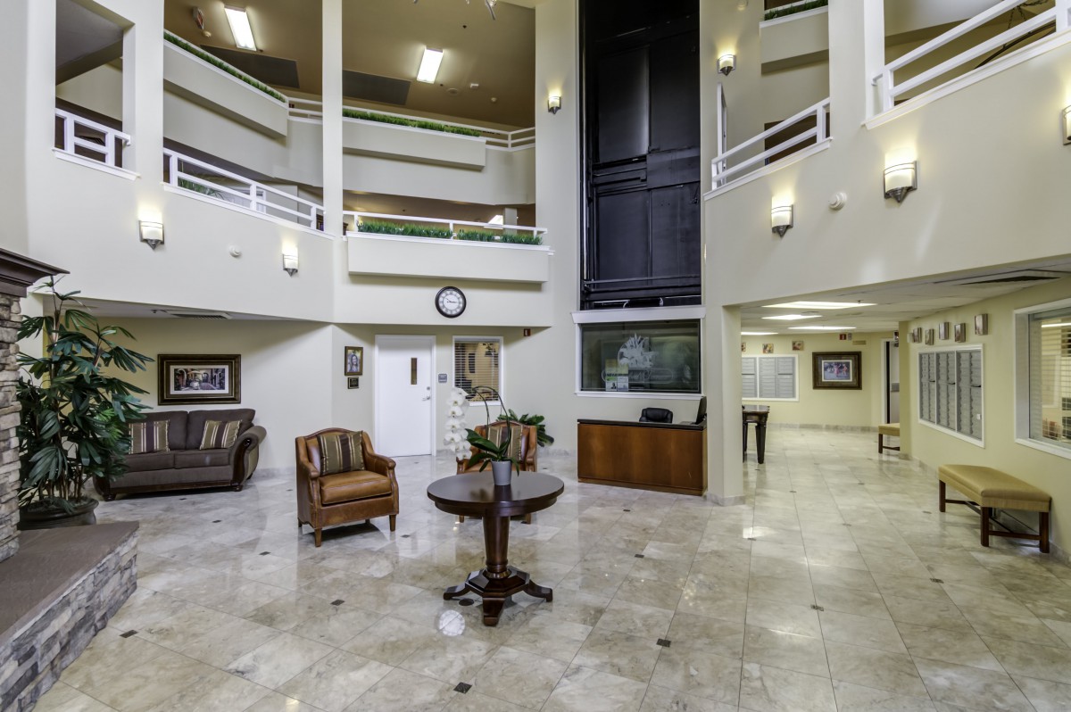 A modern and spacious lobby area with elegant furniture and contemporary design.