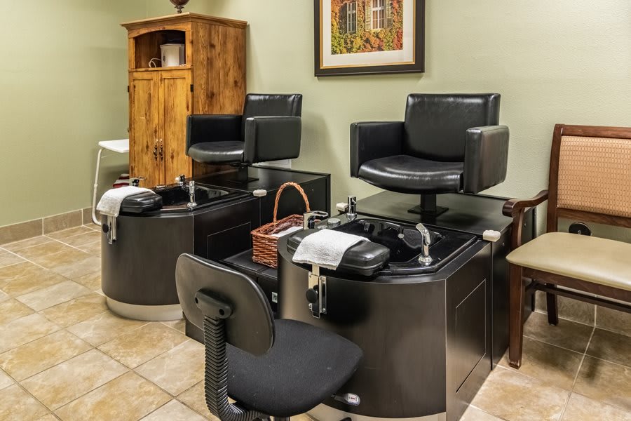 A cozy nail salon with pedicure stations ready for clients.