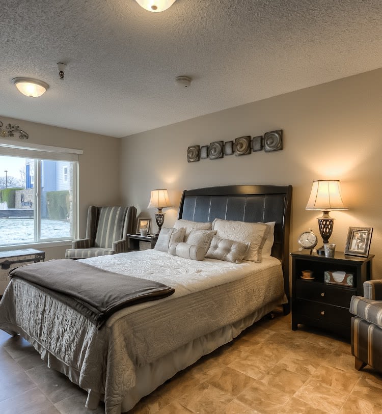 A cozy and well-furnished bedroom with elegant decor.