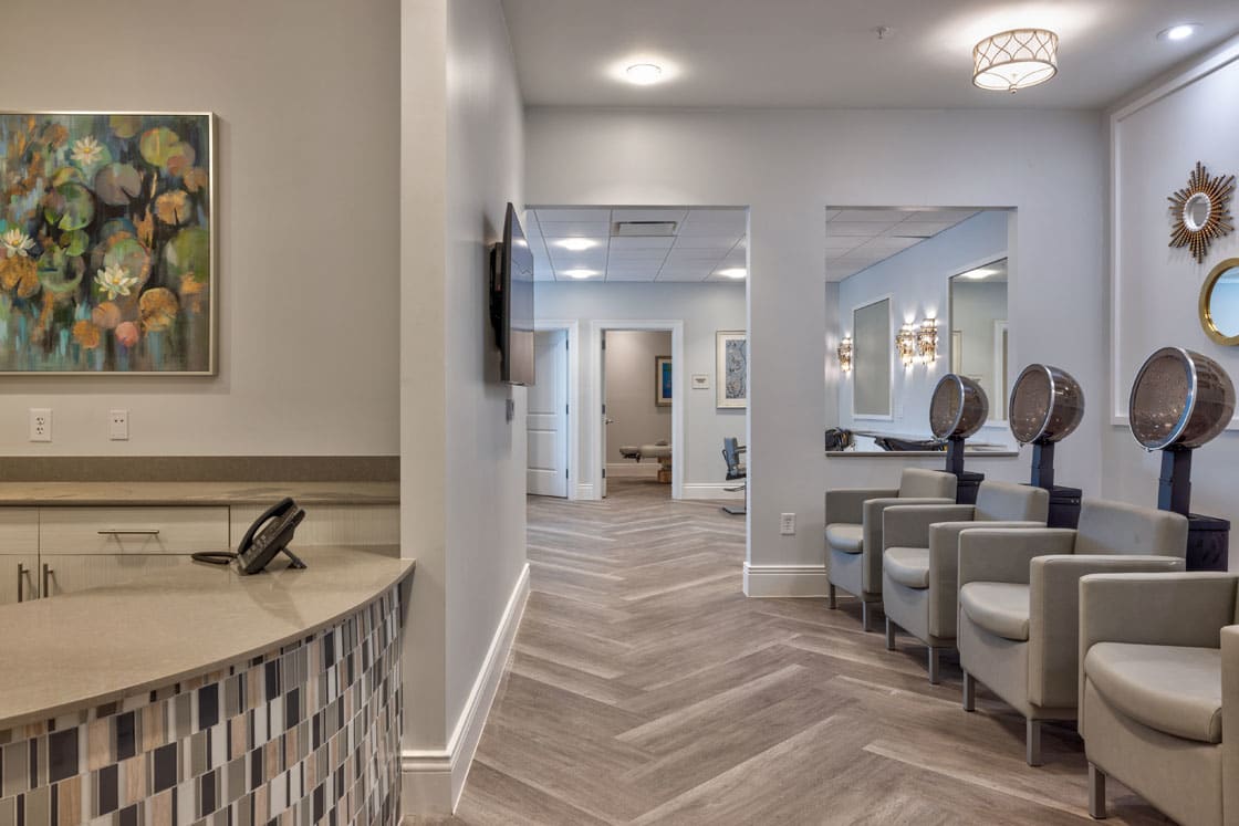 A modern reception area with stylish decor and comfortable seating.