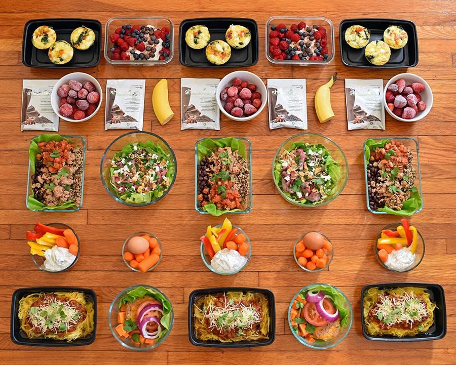 A well-organized meal prep layout showcasing a variety of healthy meals in containers.