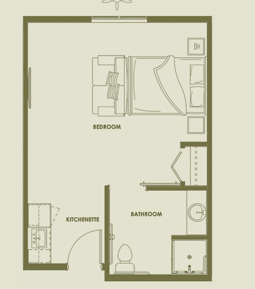 A floor plan of a small apartment featuring a bedroom, bathroom, and kitchenette.
