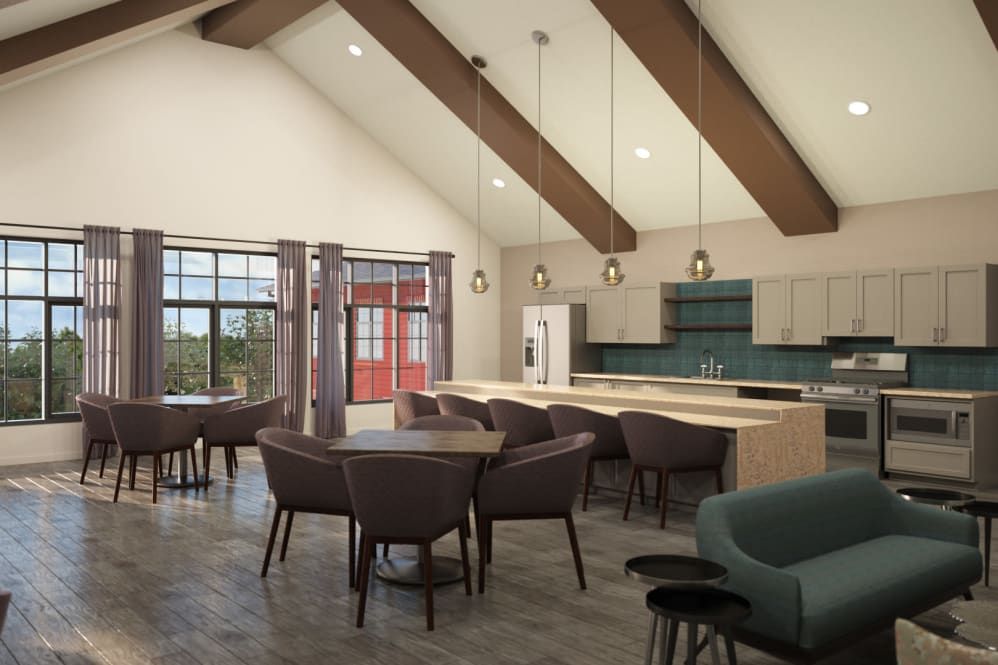 A modern kitchen and dining area featuring wood beams, contemporary furniture, and pendant lighting.