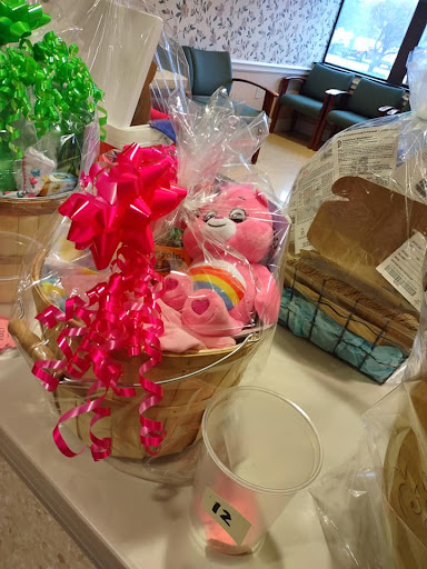 A vibrant gift basket filled with colorful toys and decorations, perfect for a child.