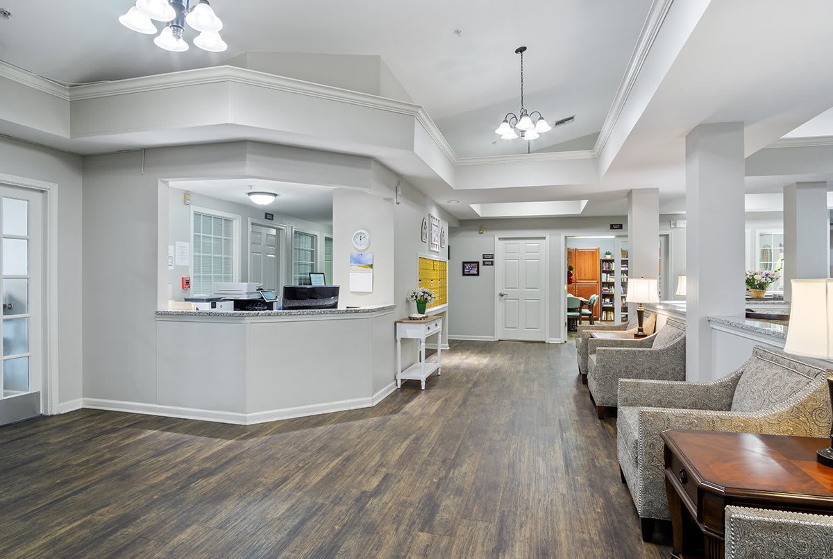 A modern reception area with comfortable seating and stylish lighting.