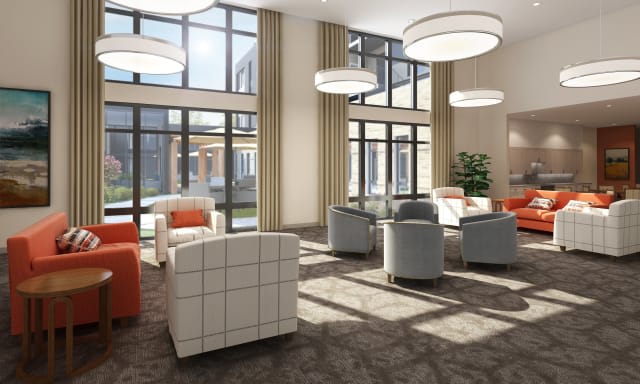 A modern lobby with comfortable seating and ample natural light.