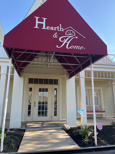 The welcoming entrance to Hearth & Home, featuring a stylish awning.