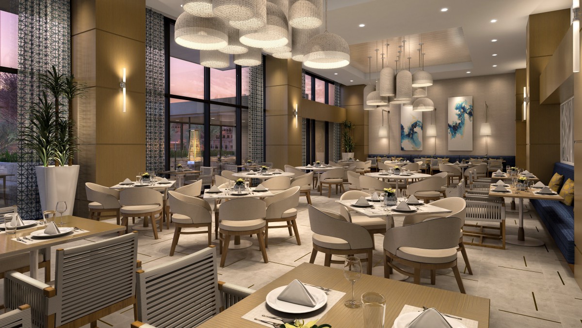 A modern and elegant restaurant interior with neatly arranged tables and chairs.