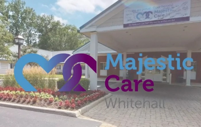The entrance of a healthcare facility with 'Majestic Care Whitenaut' signage and logo.