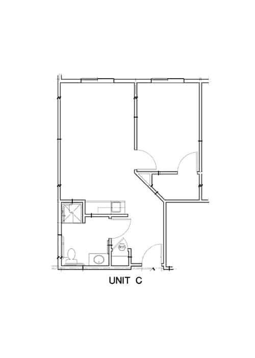 A floor plan labeled as Unit C, showing the layout of rooms and walls.