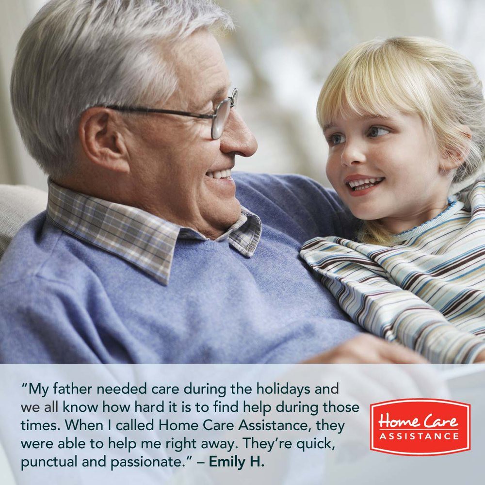 A grandfather and granddaughter share a joyful moment together, reflecting on the supportive caregiving they received during the holidays.