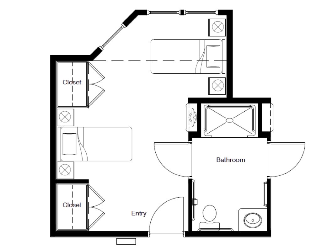 A blueprint of a room with two beds, closets, and a bathroom.