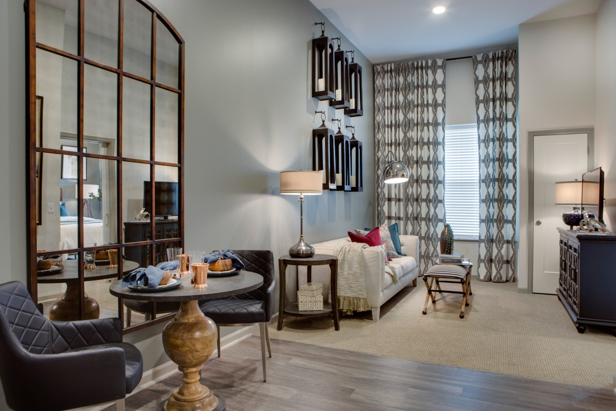 A stylish modern living room featuring elegant furniture and contemporary decor.