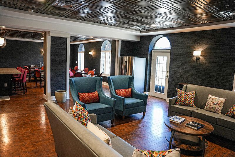 A stylish living room with elegant furniture and cozy lighting.