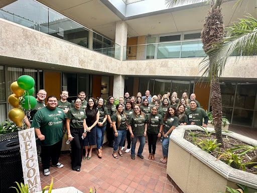 A team gathering in the courtyard, showcasing unity and a shared spirit.