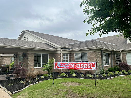 A cozy house with a banner indicating it is available for rent, specifically aimed at nurses.