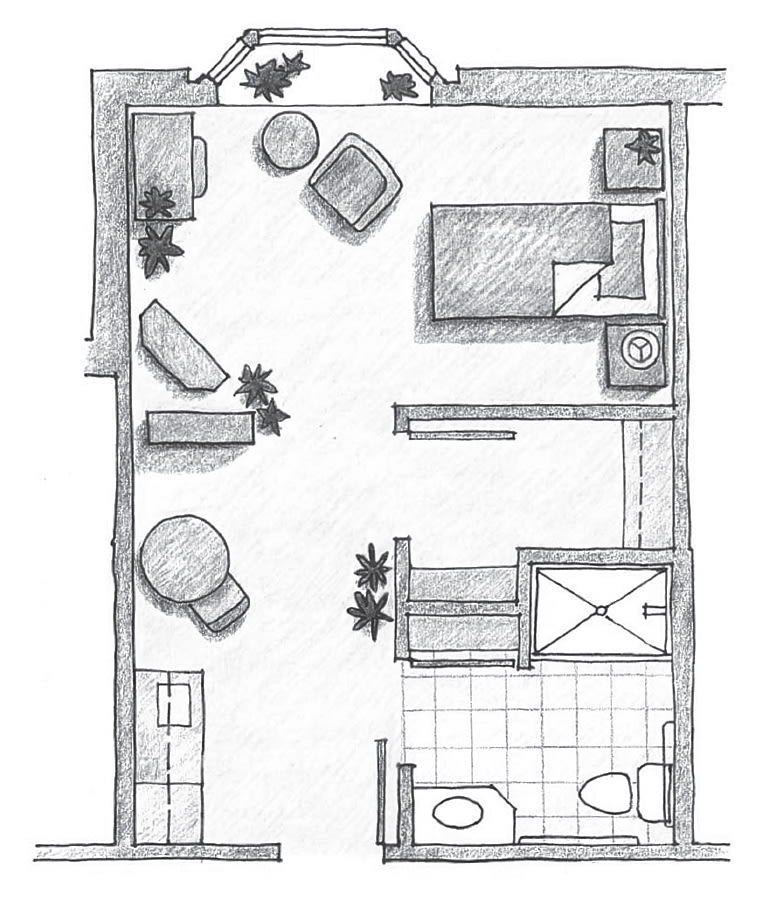 A hand-drawn floor plan of an apartment layout, featuring a bedroom, living area, and bathroom.