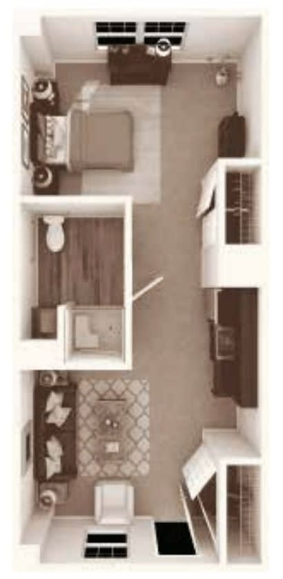 A floor plan of a compact apartment showing a bathroom, kitchen, and living area.