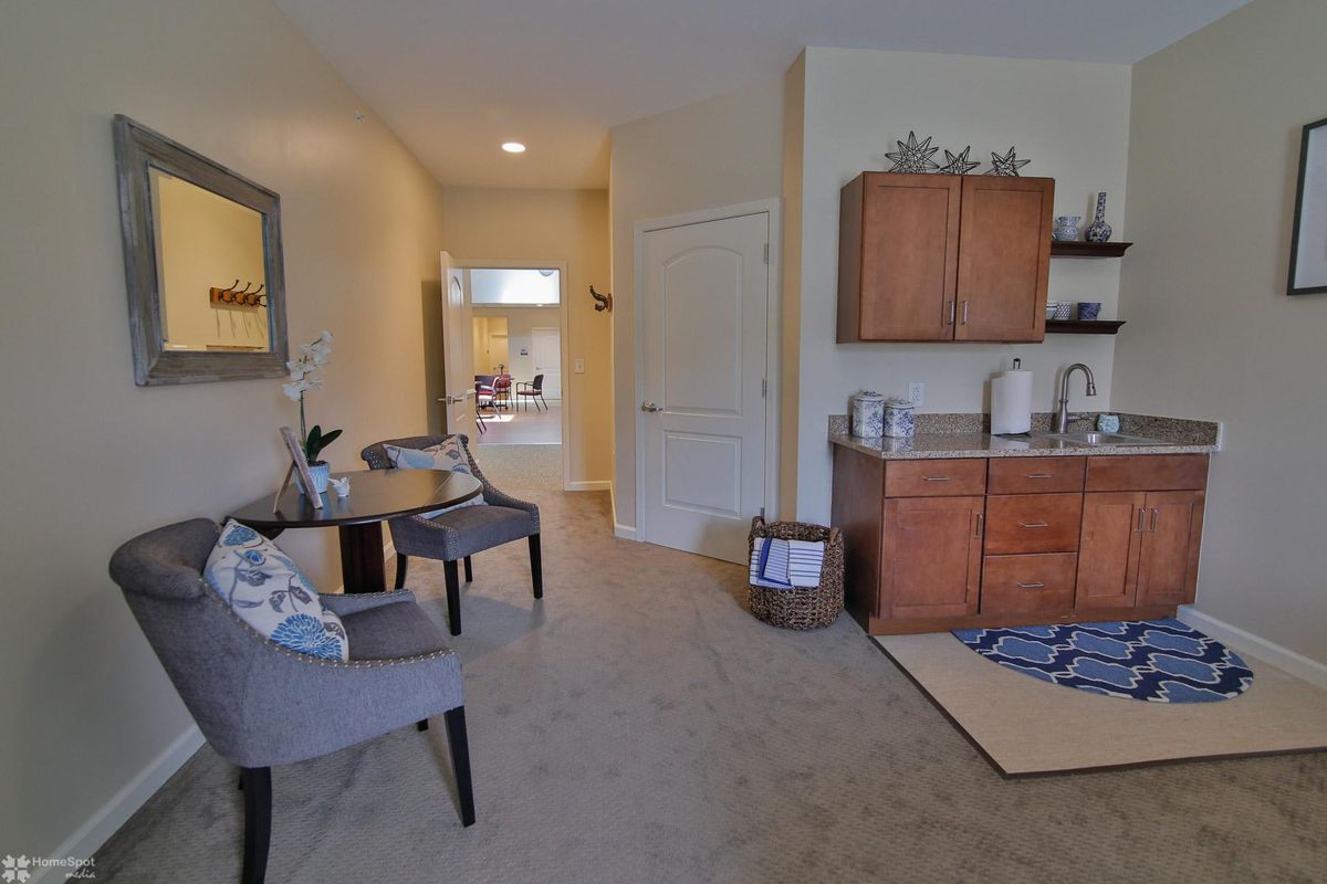 A cozy, modern living space with comfortable chairs and stylish decor.