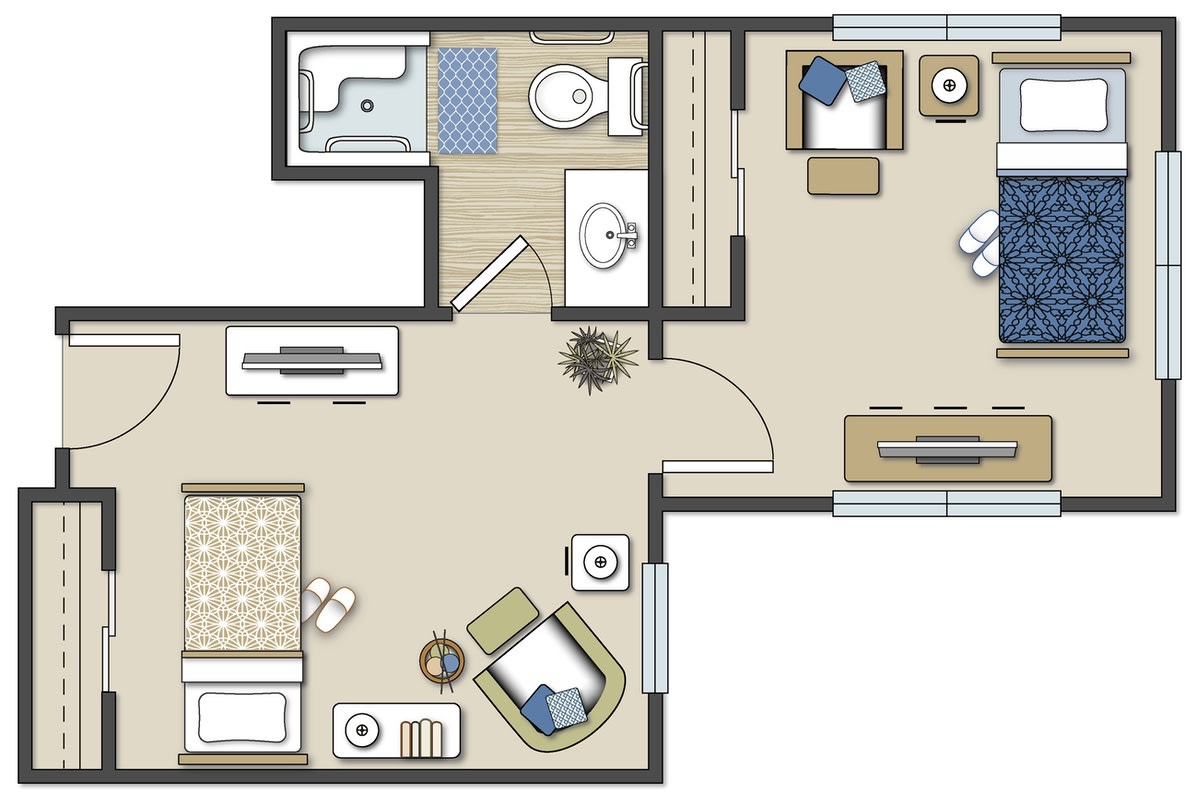 A detailed floor plan of a small apartment showing the arrangement of rooms, including a living area, kitchen, bathroom, and two bedrooms.