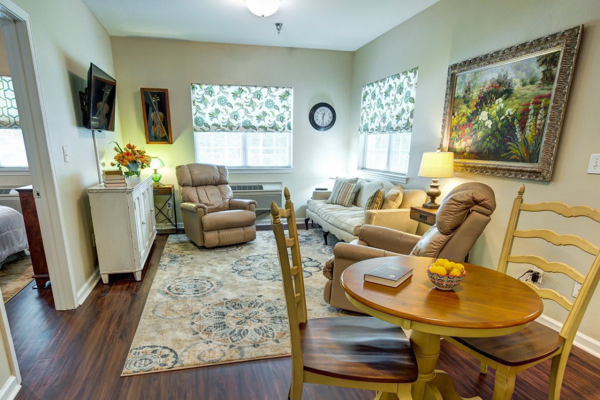 A cozy living room with comfortable seating and warm decor.