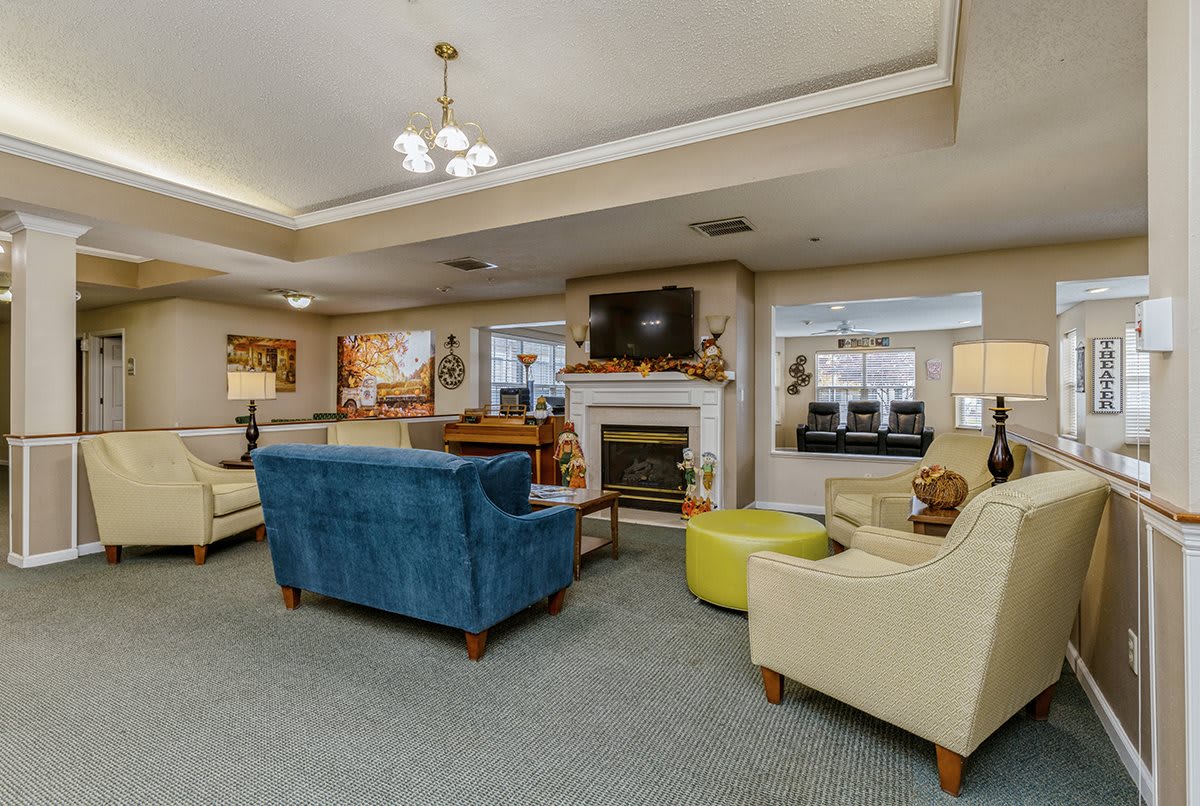 A cozy living room with comfortable sofas and a fireplace.