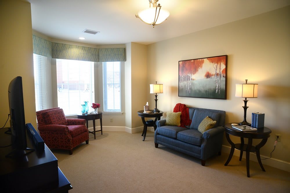 A cozy living room with comfortable seating and tasteful decor.