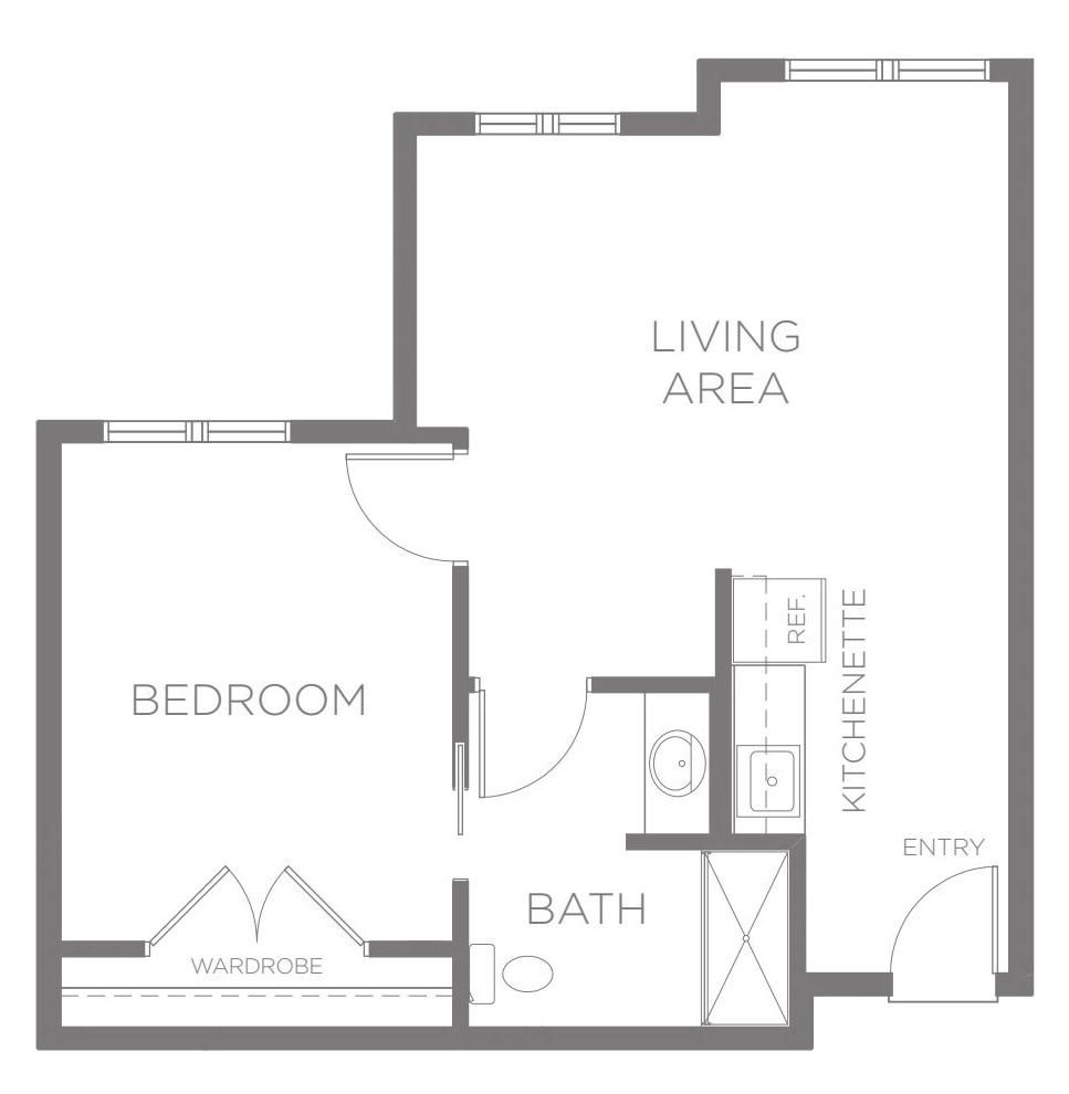 Simple one-bedroom apartment floor plan with a living area and bathroom.