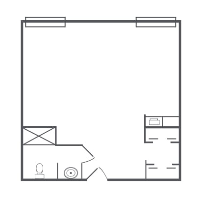 A simple floor plan featuring a bathroom and storage area, with entry door placement.