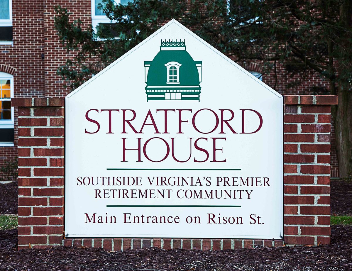 A sign for Stratford House, a premier retirement community in Southside Virginia, indicating the main entrance on Rison St.