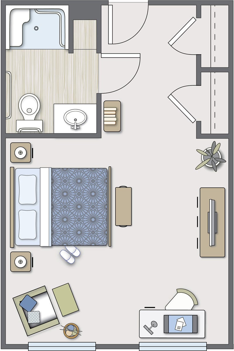 A floor plan of a bedroom with an attached bathroom, showing the arrangement of furniture and fixtures.