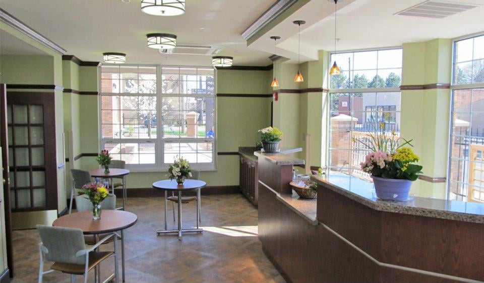 A modern reception area with natural lighting and contemporary furnishings.