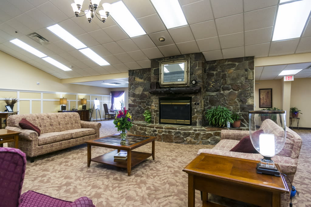 Elegant living room with cozy fireplace and comfortable seating.