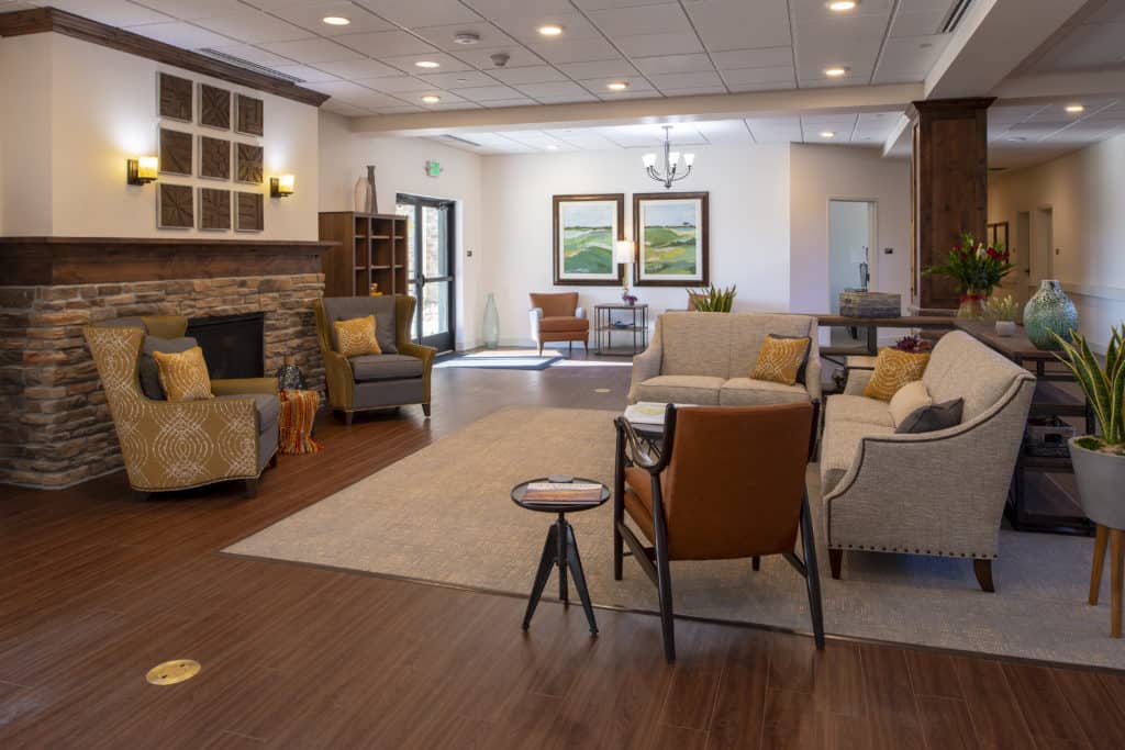 A modern and cozy living room with comfortable seating and stylish decor.