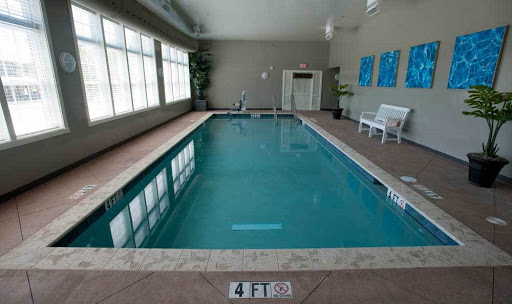 A serene indoor swimming pool, perfect for relaxation and fitness.