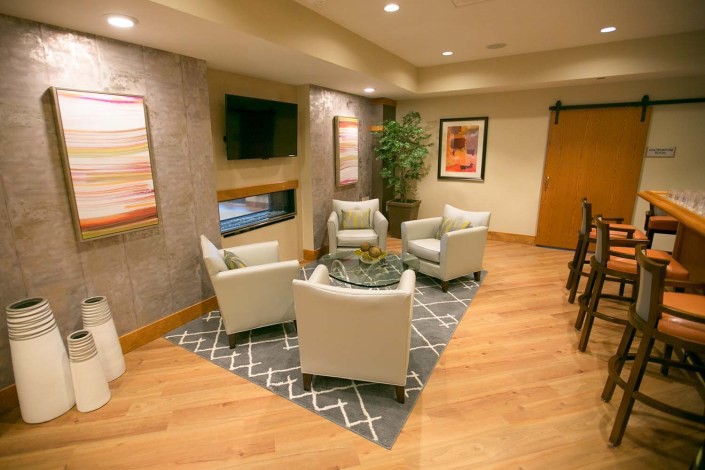 Cozy seating area with modern decor and soft lighting.