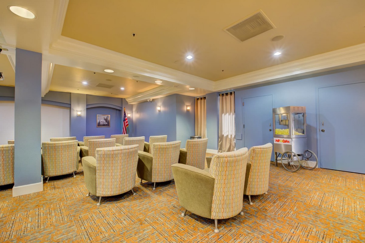 A cozy lounge area with comfortable seating and warm lighting.