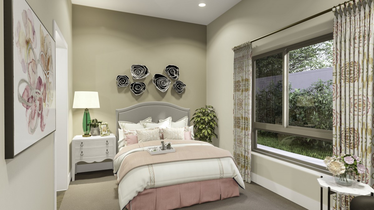 A cozy and elegantly decorated bedroom with modern wall art and a view of the garden.