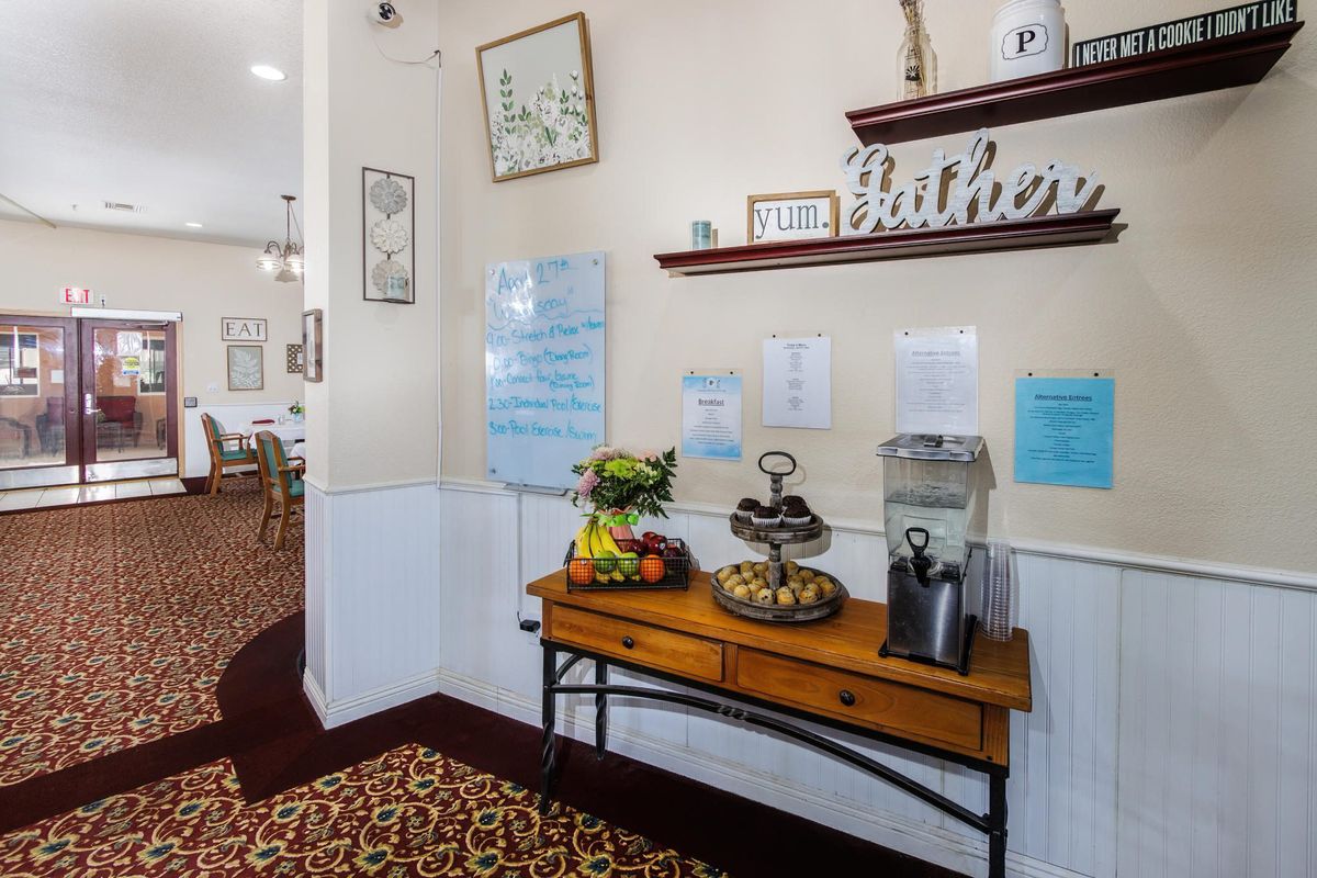 A welcoming lobby area with refreshments and decorative elements.
