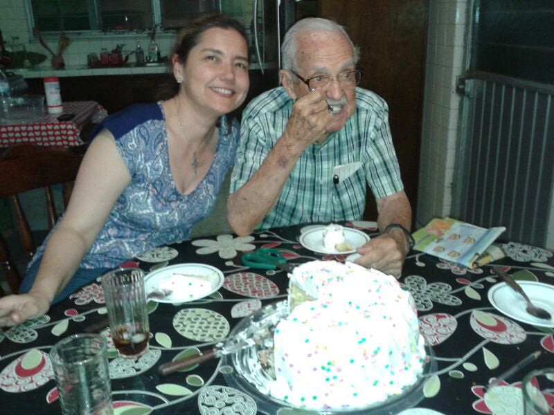 A joyful moment during a birthday celebration with cake and smiles.