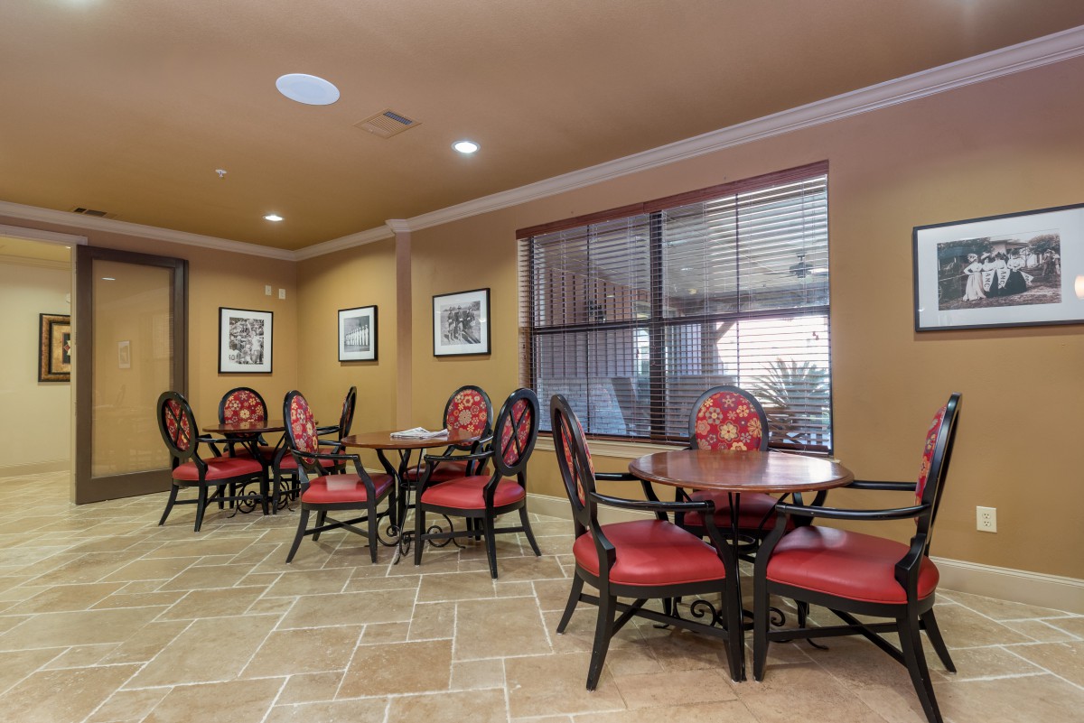 A cozy dining area with elegant decor and comfortable seating.