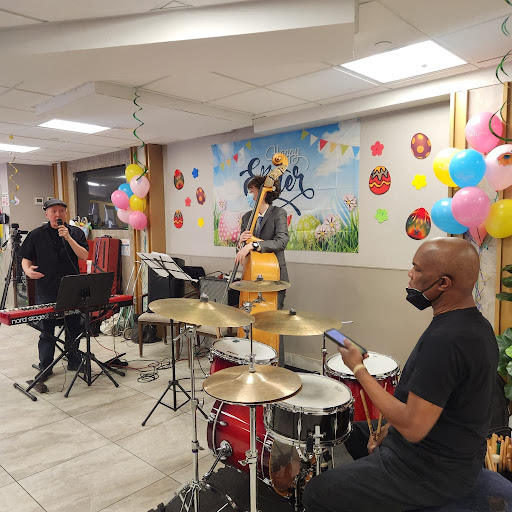 A lively jazz band performing in a decorated space, bringing music and joy to the atmosphere.